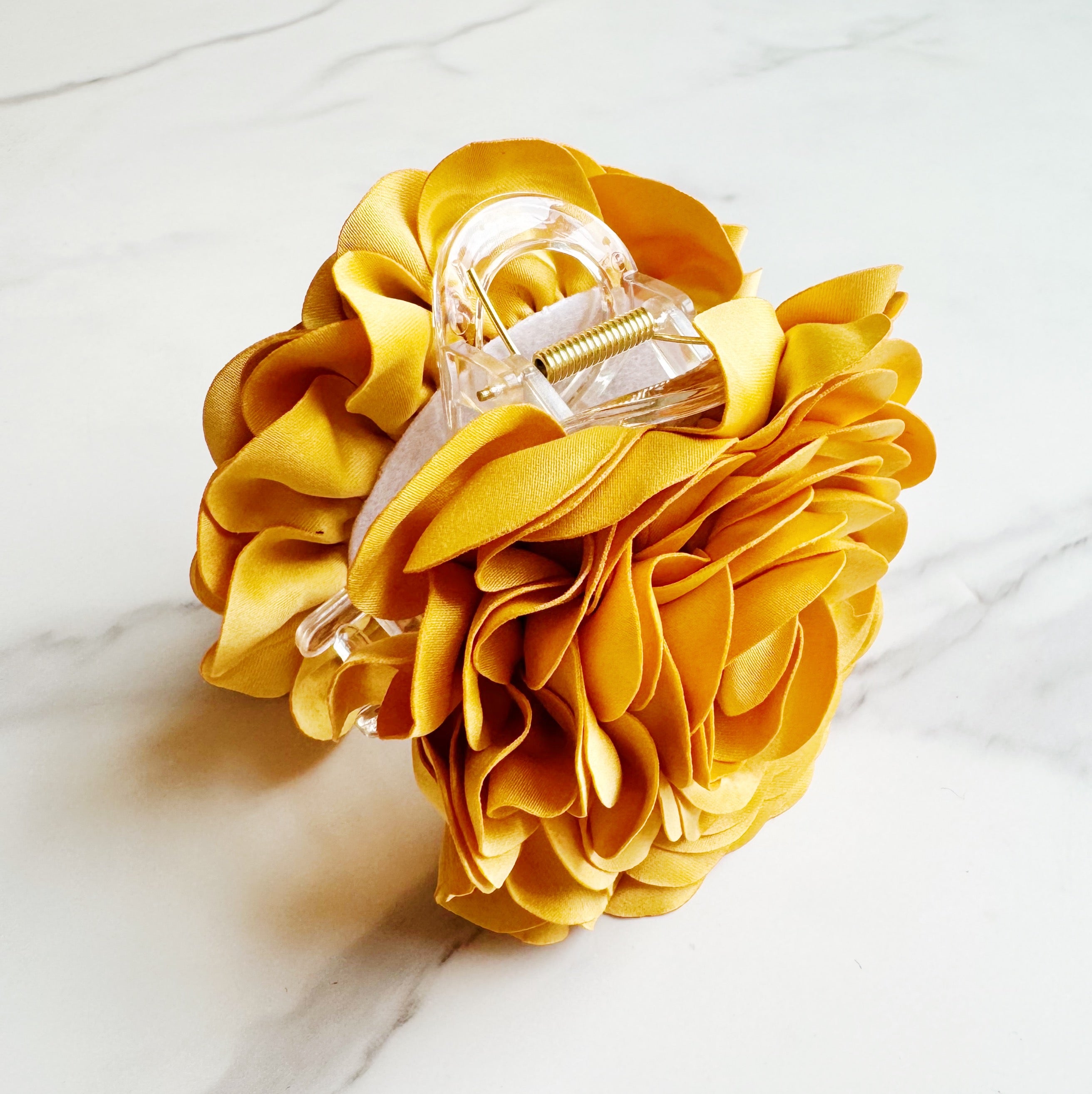 Full Bloom Double Sided Hair Claw featuring a delicate flower design, perfect for elegant hairstyles.