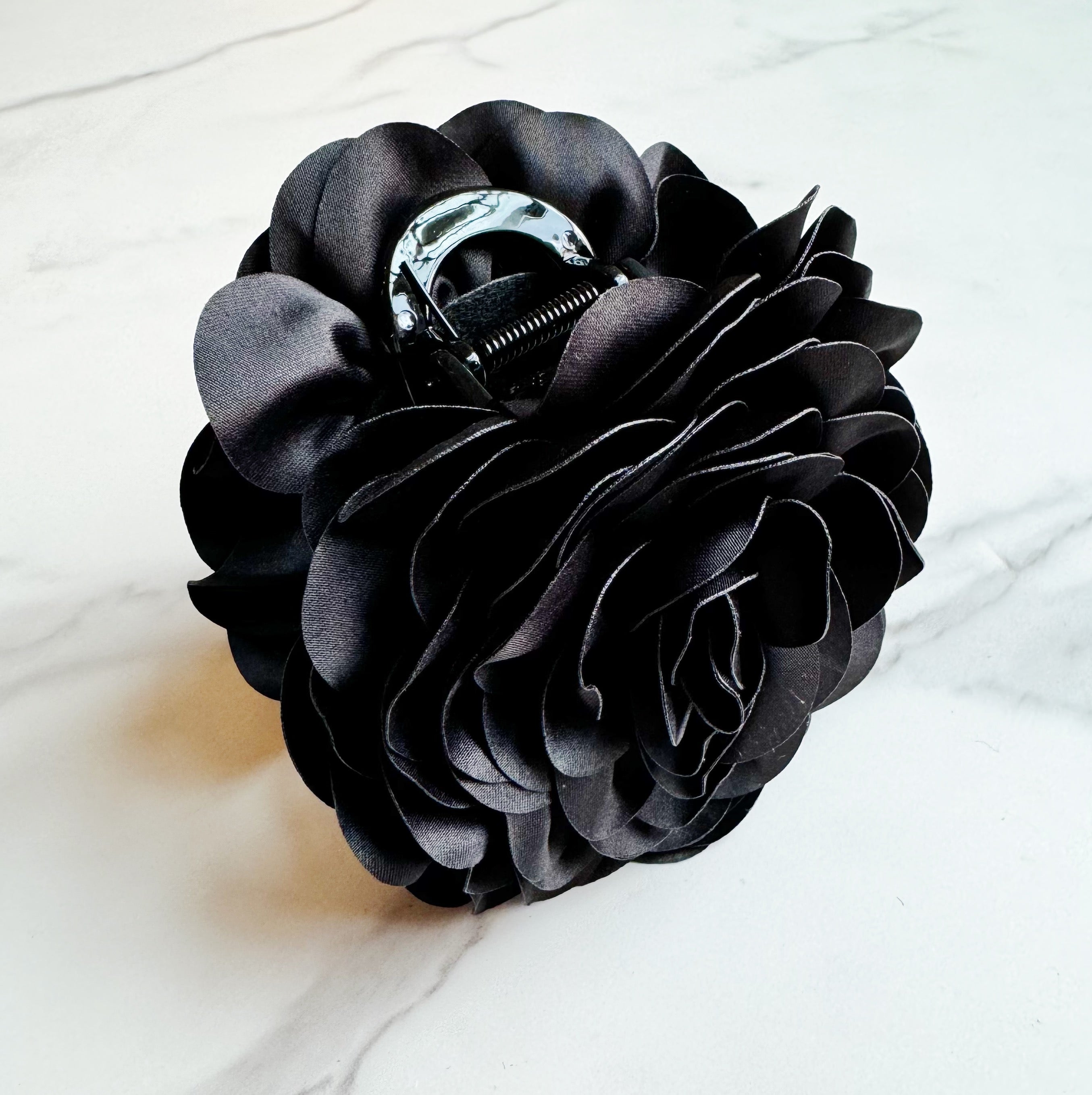 Full Bloom Double Sided Hair Claw featuring a delicate flower design, perfect for elegant hairstyles.