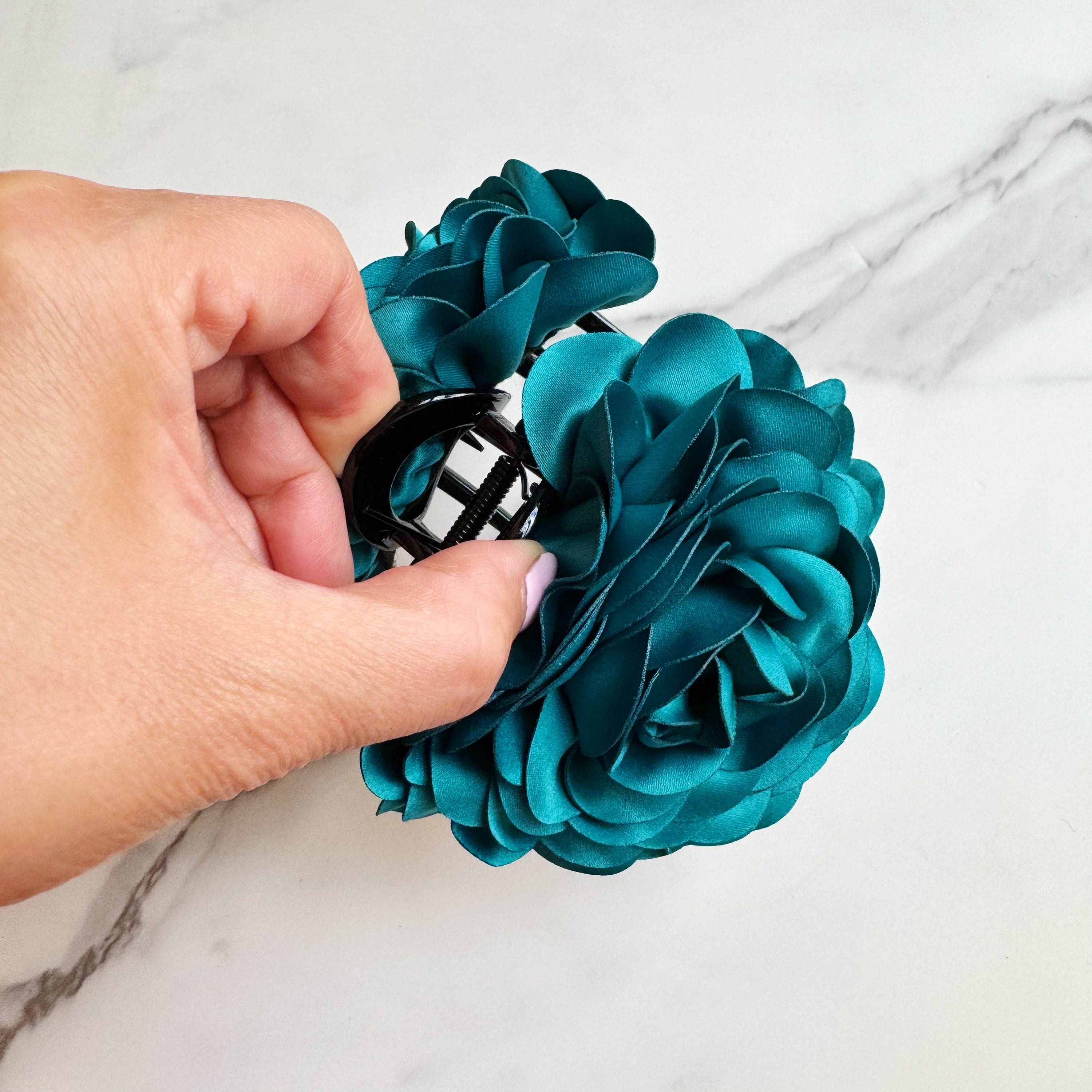 Full Bloom Double Sided Hair Claw featuring a delicate flower design, perfect for elegant hairstyles.