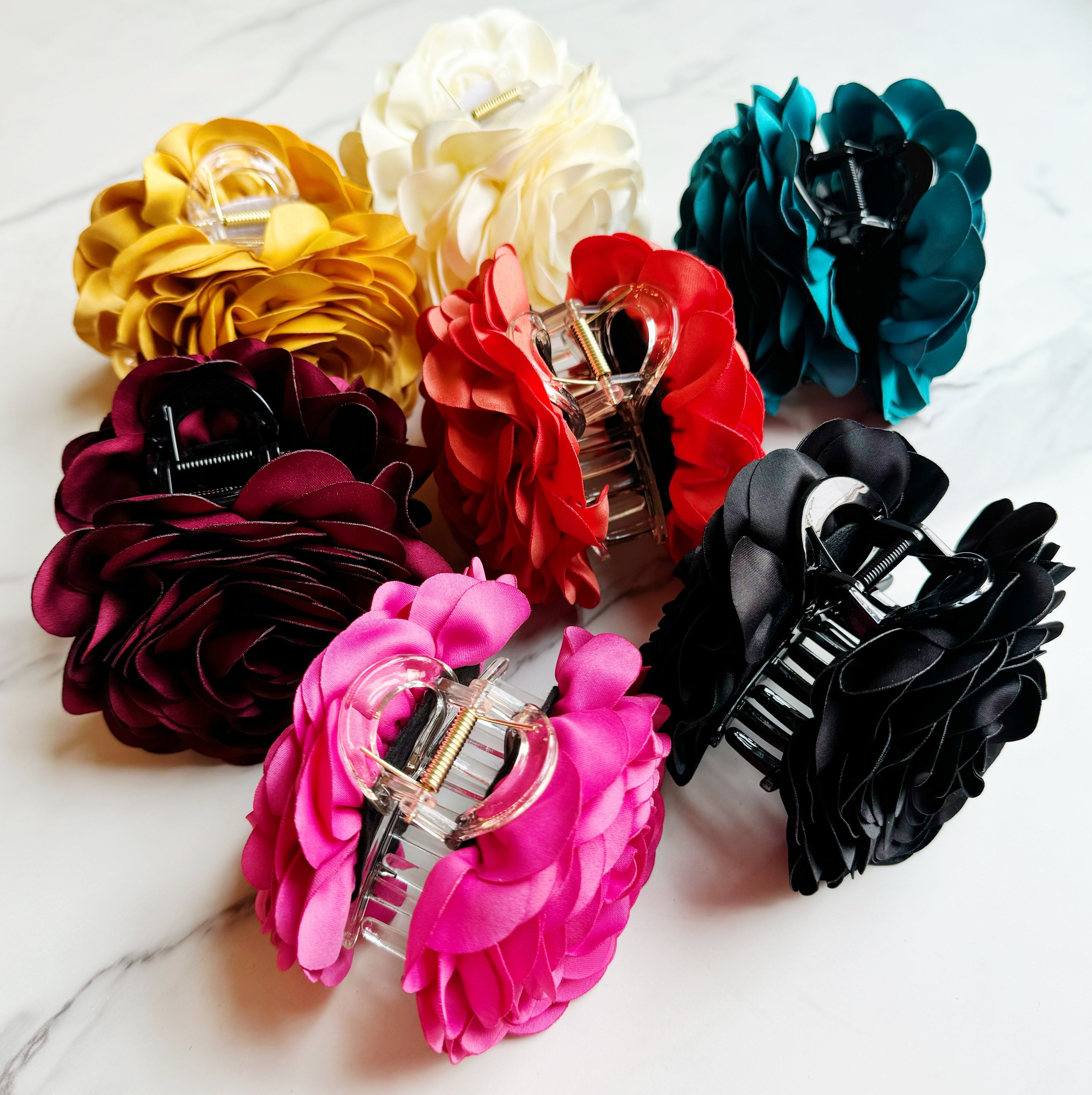 Full Bloom Double Sided Hair Claw featuring a delicate flower design, perfect for elegant hairstyles.