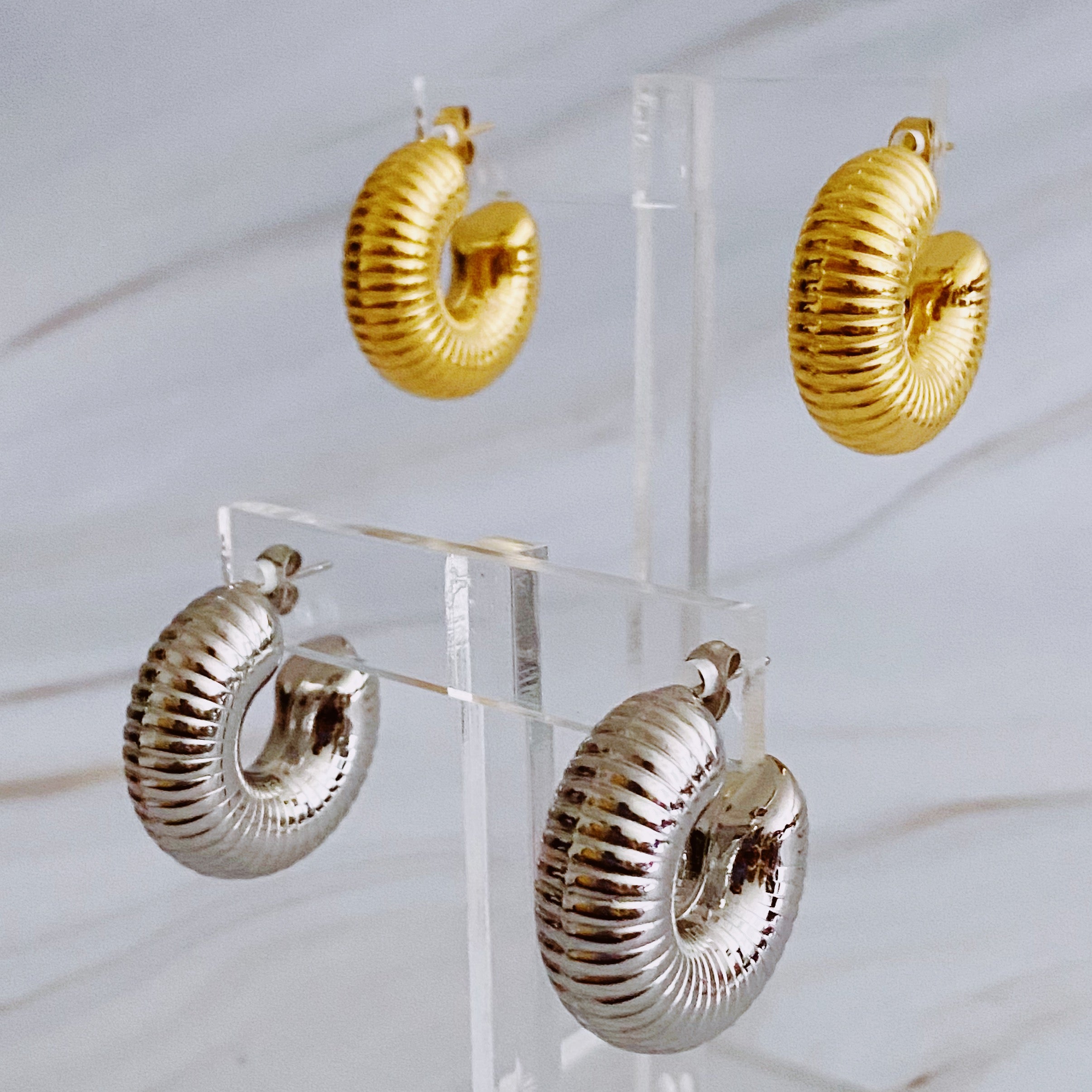 Elegant Full Body In Pleats Hoop Earrings with shiny textured finish, crafted from 18k gold plated stainless steel.