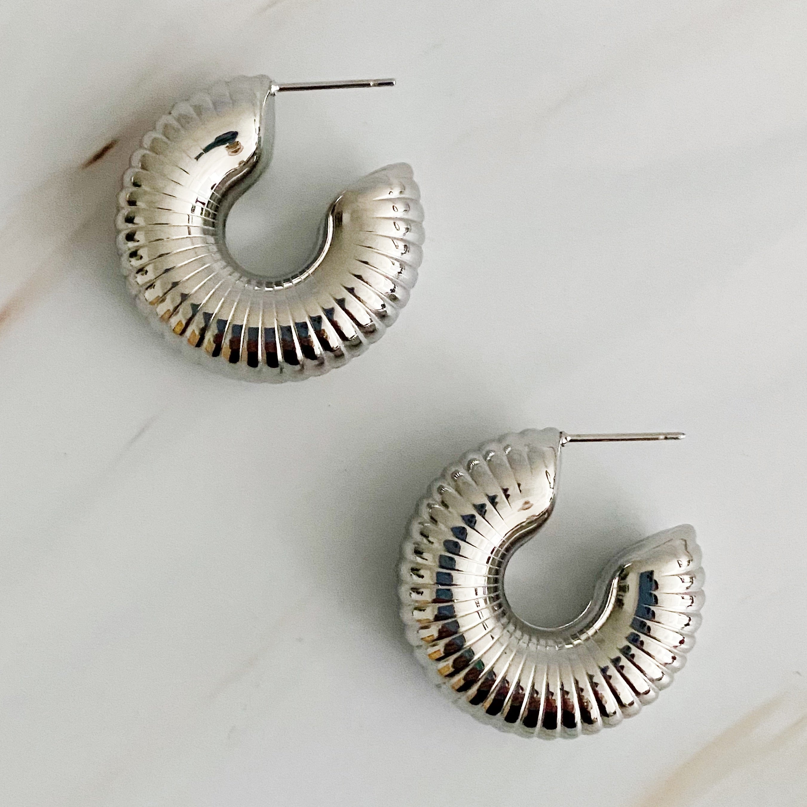 Elegant Full Body In Pleats Hoop Earrings with shiny textured finish, crafted from 18k gold plated stainless steel.