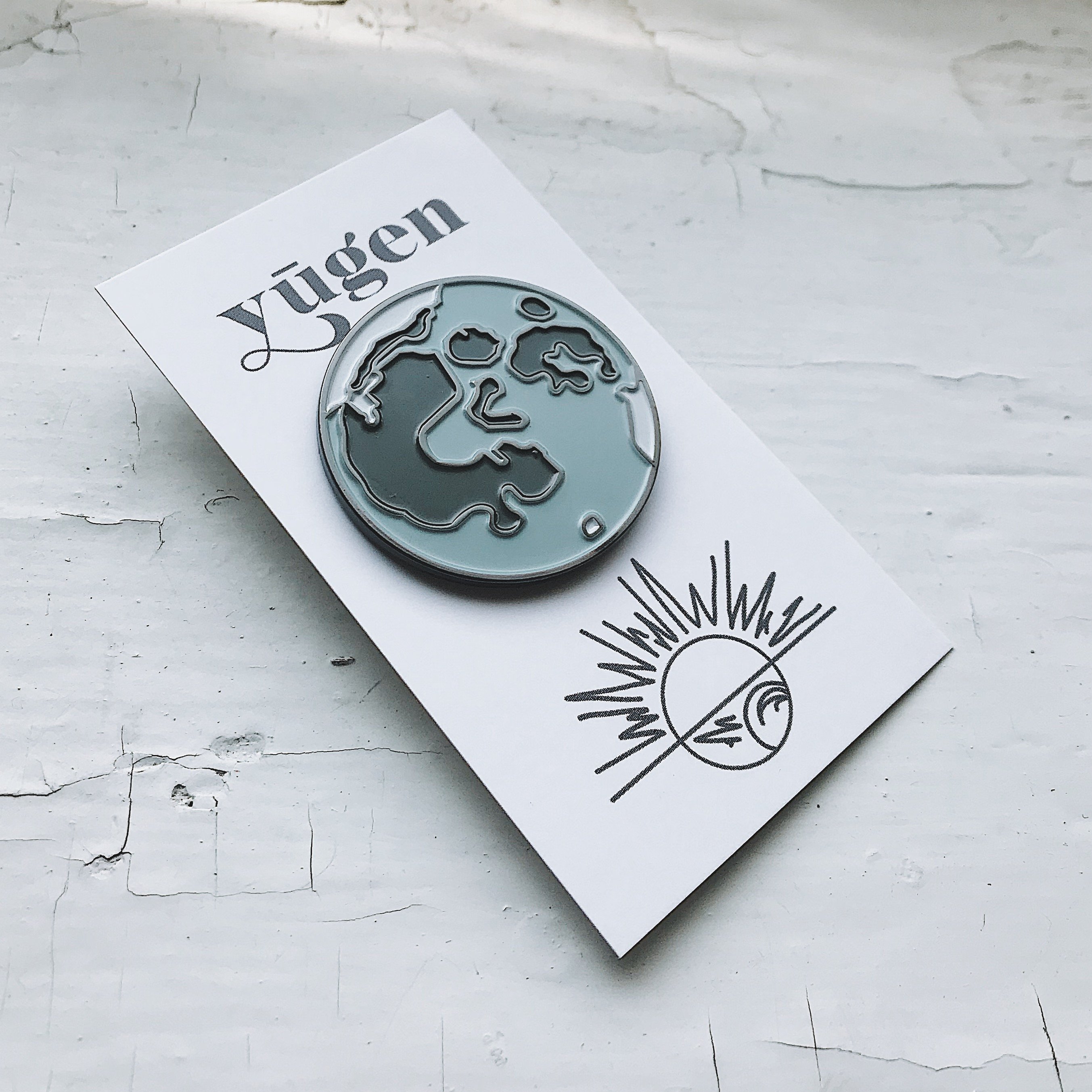 Full Moon Enamel Pin featuring a detailed illustration of the moon, perfect for jackets and backpacks.