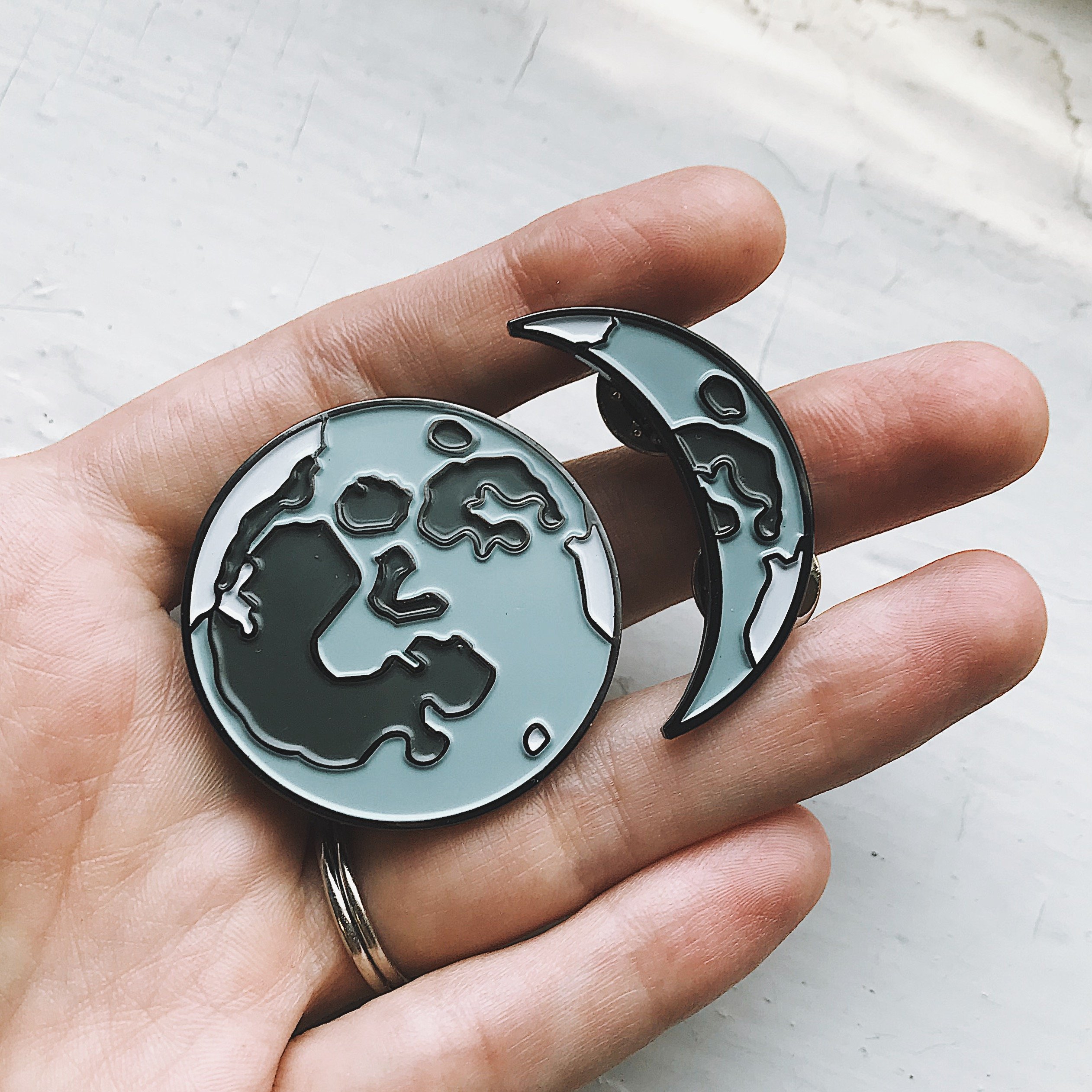 Full Moon Enamel Pin featuring a detailed illustration of the moon, perfect for jackets and backpacks.