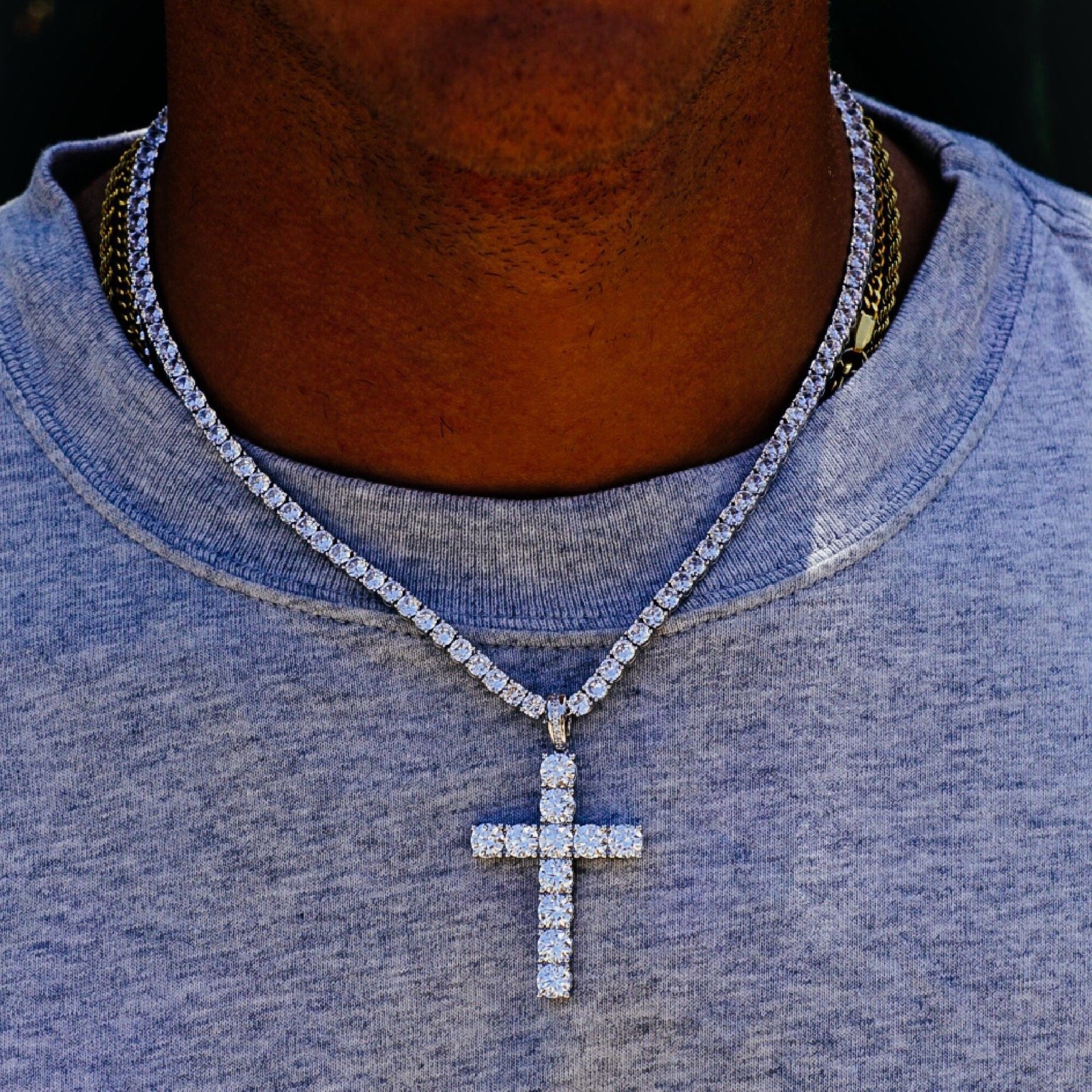 GALORE 3 MM Tennis Bundle featuring a sparkling cubic zirconia necklace and cross pendant, showcasing its elegant design and quality craftsmanship.