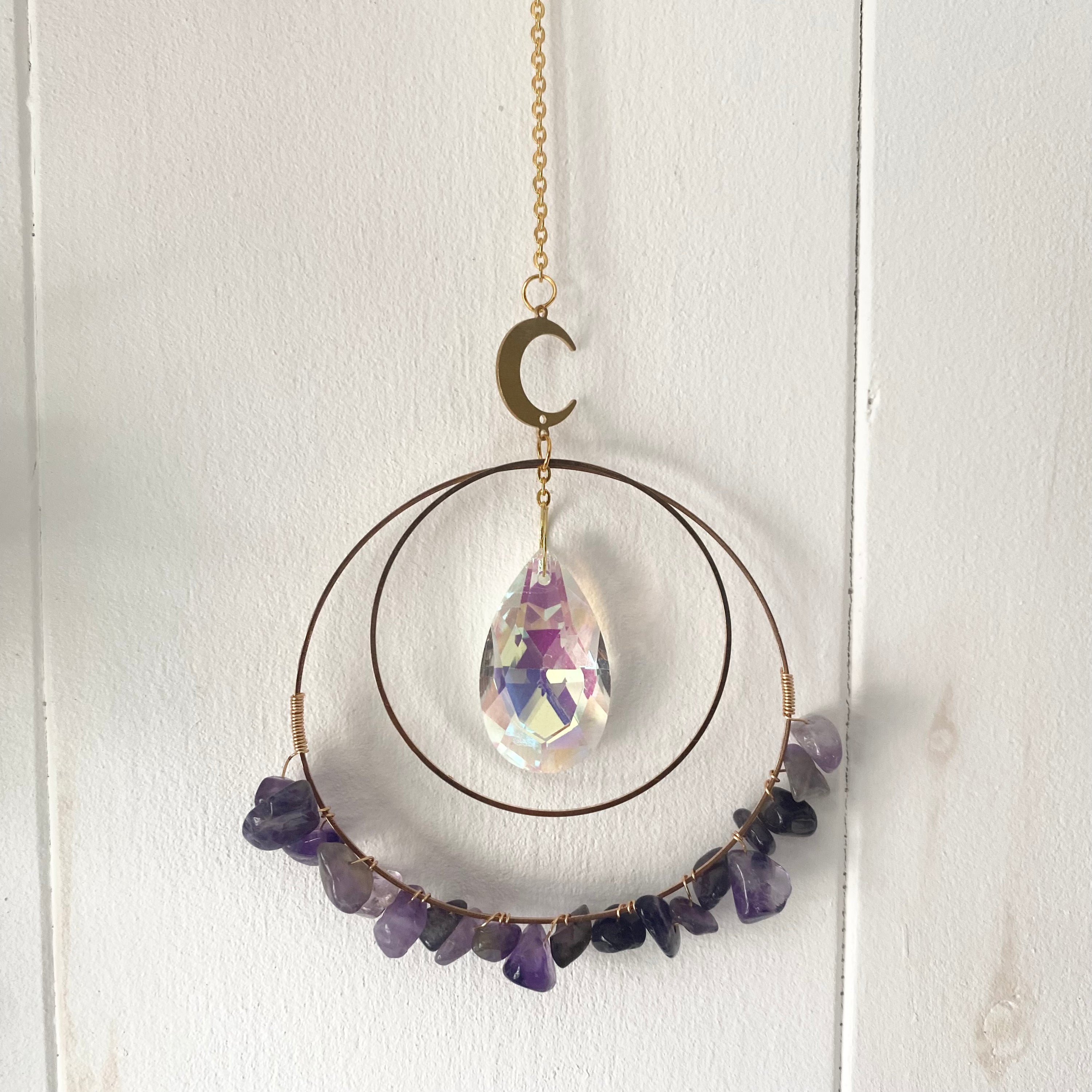 Colorful Gemstone Chip Sun Catchers hanging in sunlight, showcasing vibrant reflections.