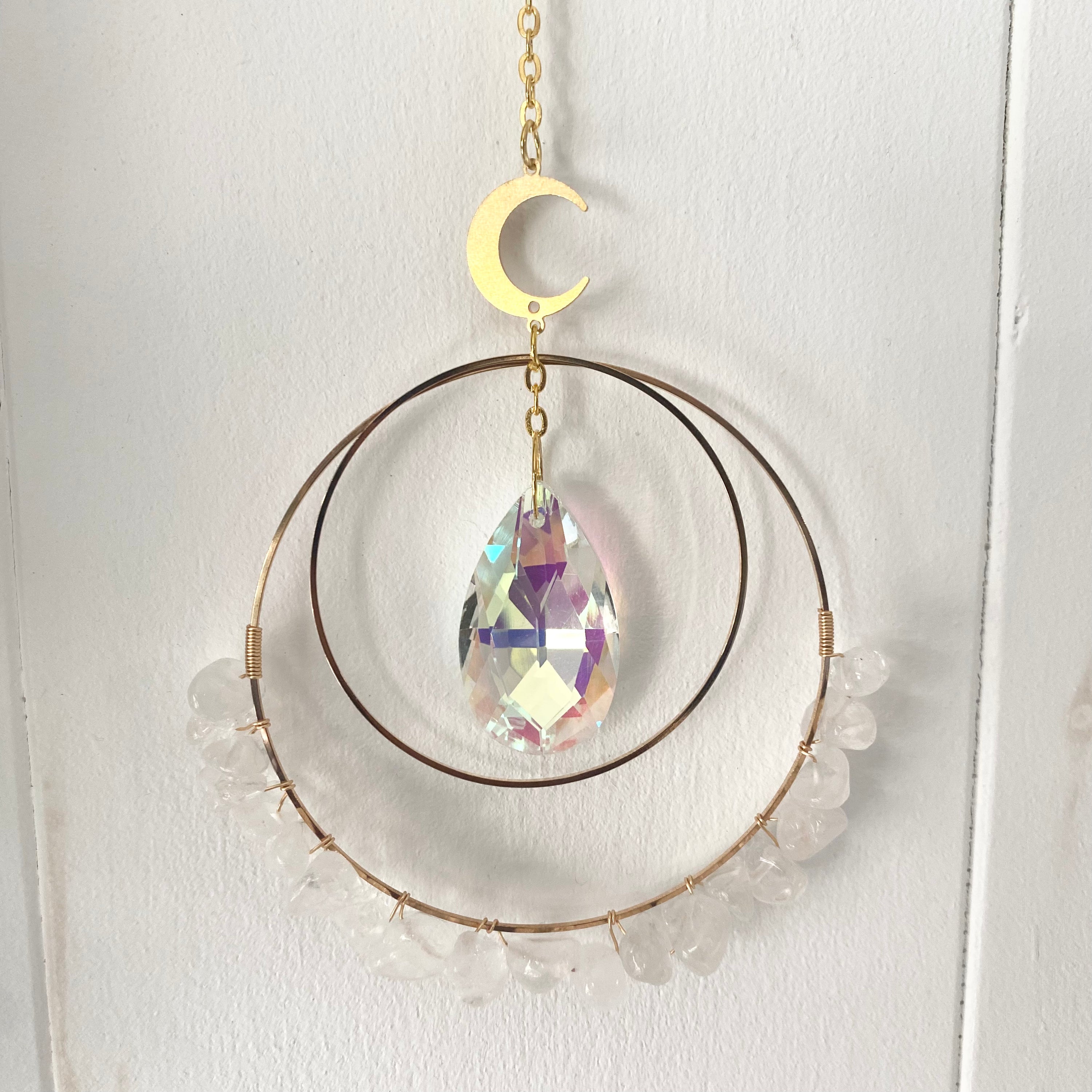 Colorful Gemstone Chip Sun Catchers hanging in sunlight, showcasing vibrant reflections.