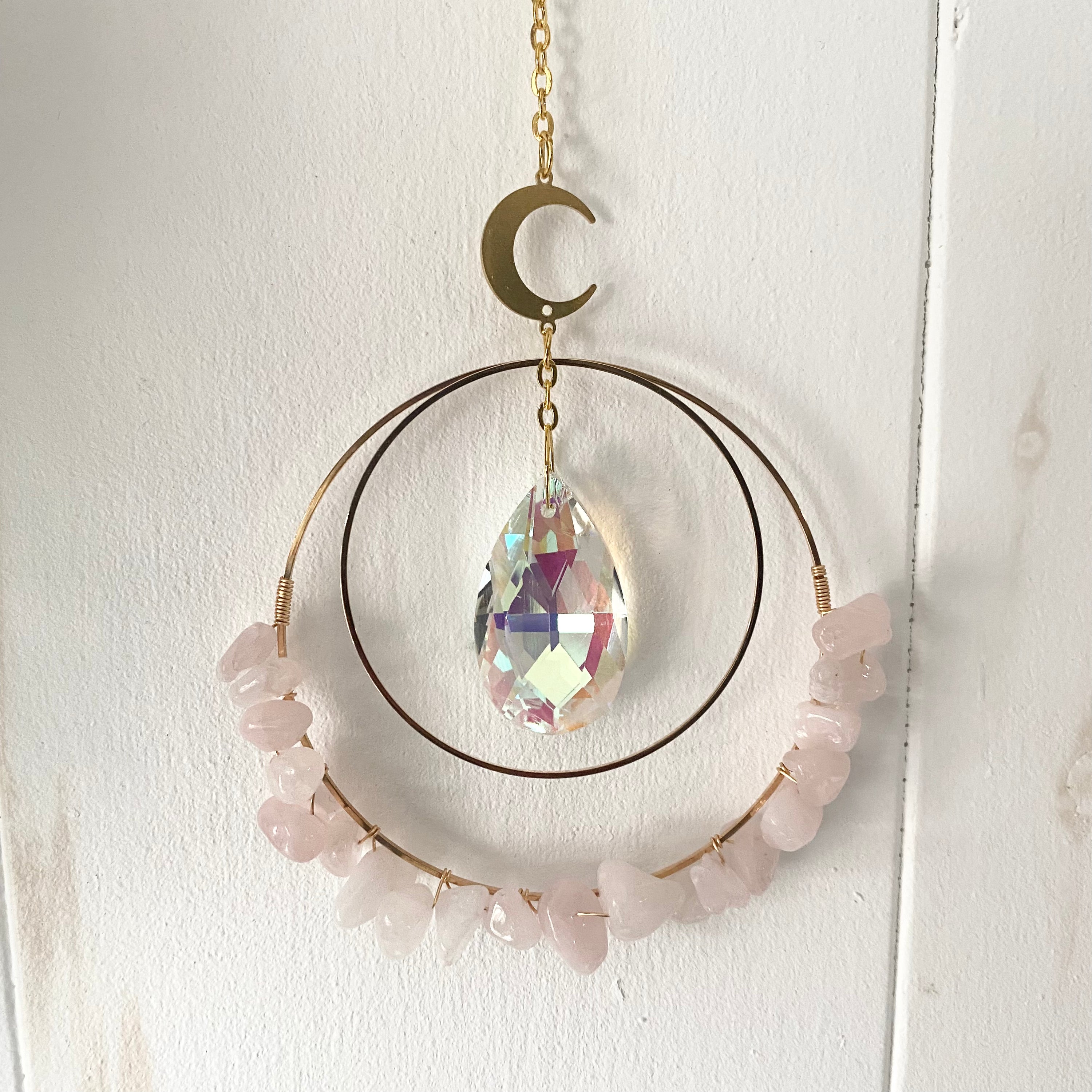 Colorful Gemstone Chip Sun Catchers hanging in sunlight, showcasing vibrant reflections.