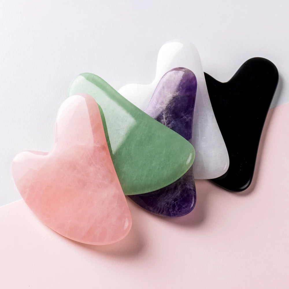 Gemstone Gua Sha Facial Tool in jade, designed for facial massage and skincare enhancement.