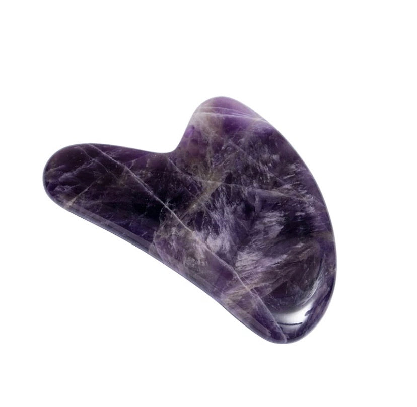 Gemstone Gua Sha Facial Tool in jade, designed for facial massage and skincare enhancement.