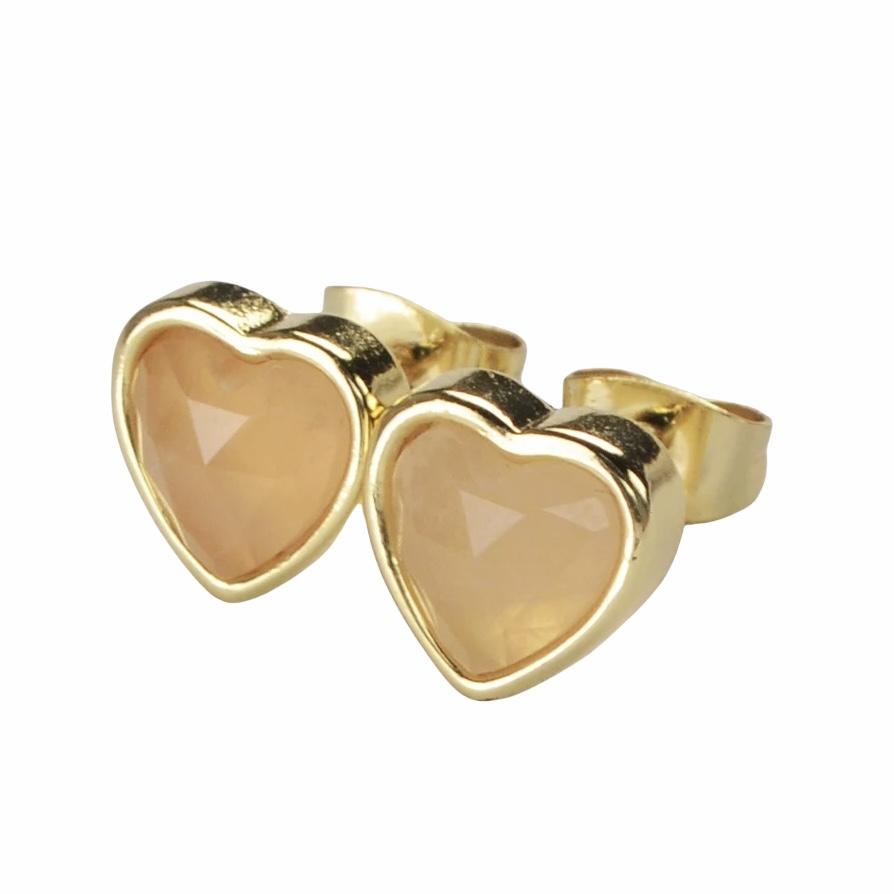 A pair of heart-shaped gemstone studs in amethyst, moonstone, and rose quartz, set in brass with 18K gold plating.