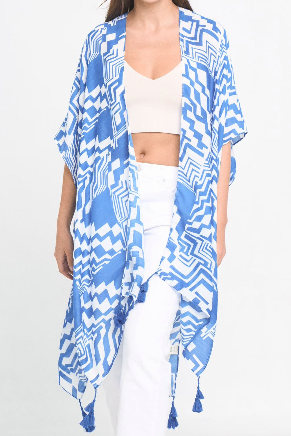 A stylish Geometric Art Kimono featuring an abstract print, lightweight and flowy, perfect for layering over outfits.