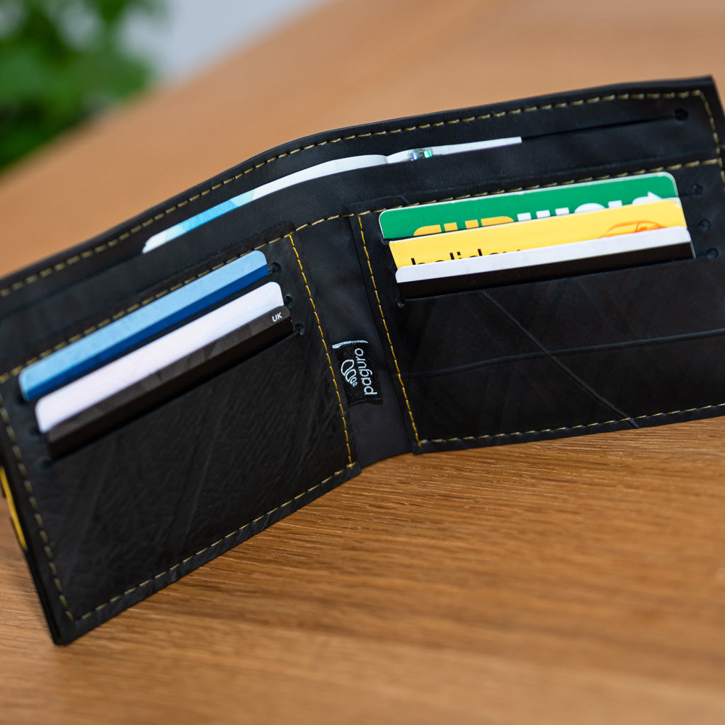 George Inner Tube Vegan Wallet made from reclaimed inner tubes, featuring vibrant stitching and multiple card compartments.