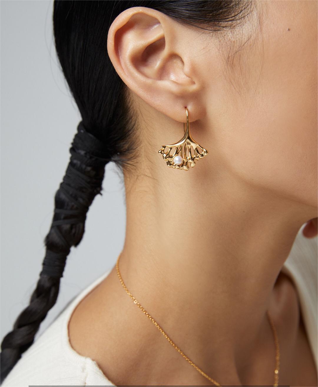 Elegant Ginkgo Leaf Pearl Earrings featuring natural pearls and gold vermeil, showcasing a unique leaf design.