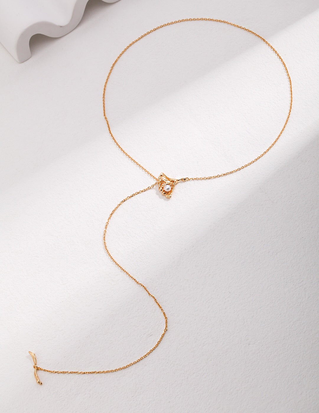 Ginkgo Leaf Pearls Necklace featuring freshwater pearls and gold vermeil pendant, elegantly designed for a sophisticated look.