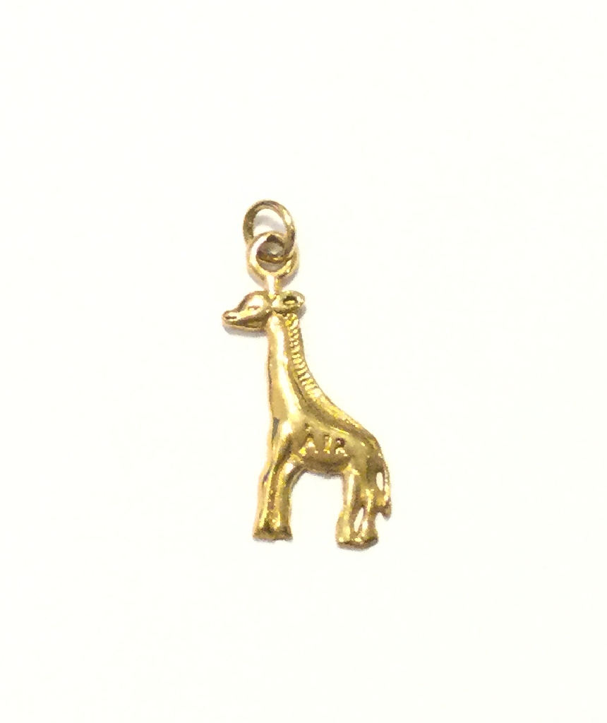 A stylish Giraffe Pendant made of brass, featuring intricate detailing and a sleek design, perfect for any outfit.