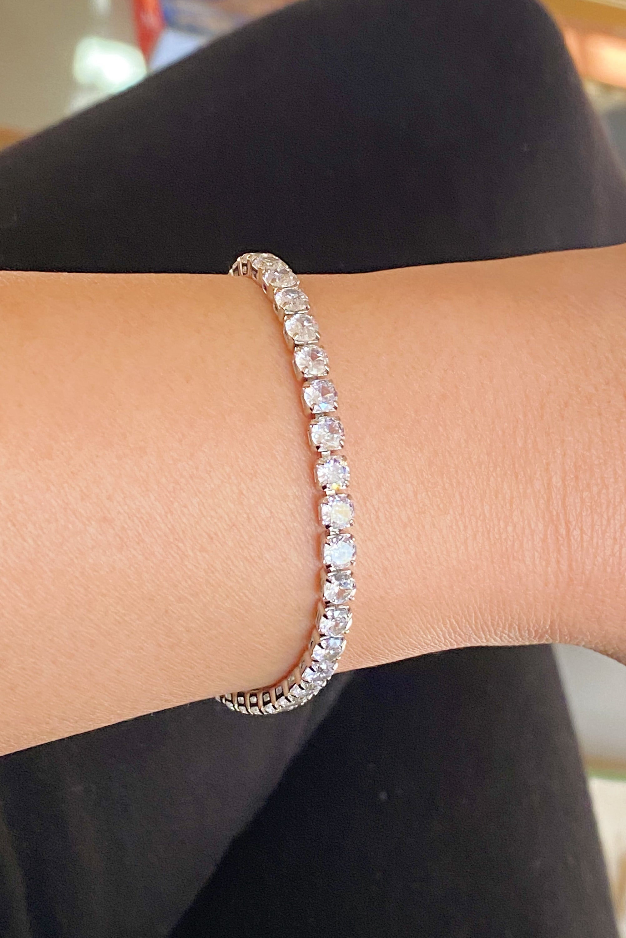 Girls Dream Tennis Bracelet featuring sparkling cubic zirconia stones set in a brass chain with a secure clasp closure.