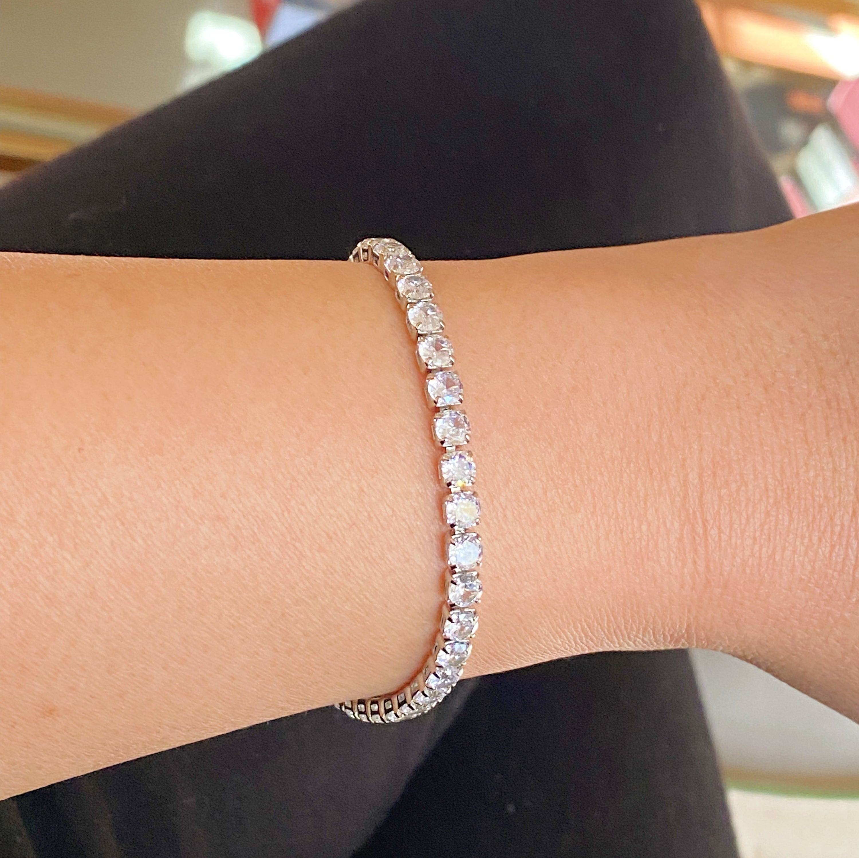 Girls Dream Tennis Bracelet featuring sparkling cubic zirconia stones set in a brass chain with a secure clasp closure.