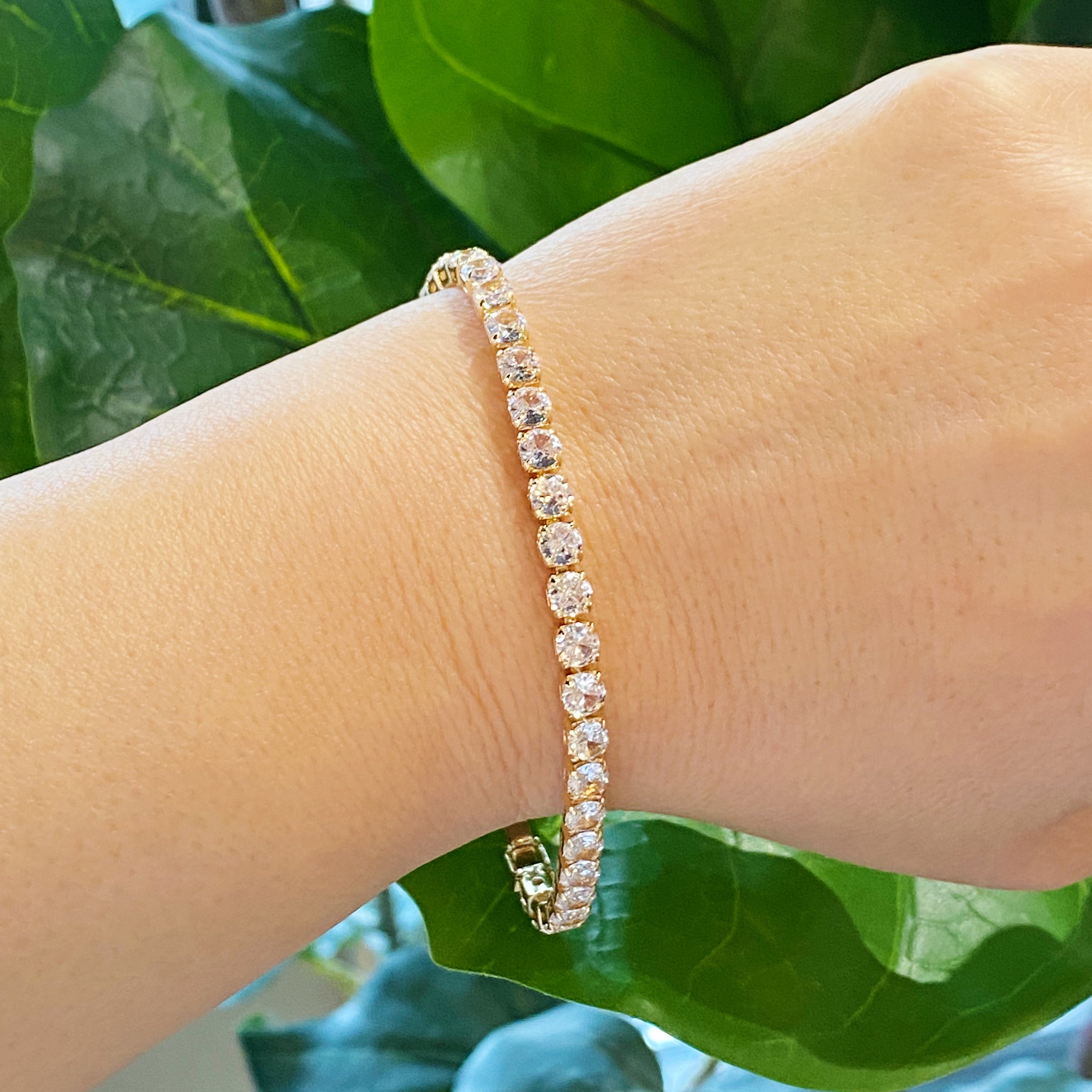 Girls Dream Tennis Bracelet featuring sparkling cubic zirconia stones set in a brass chain with a secure clasp closure.