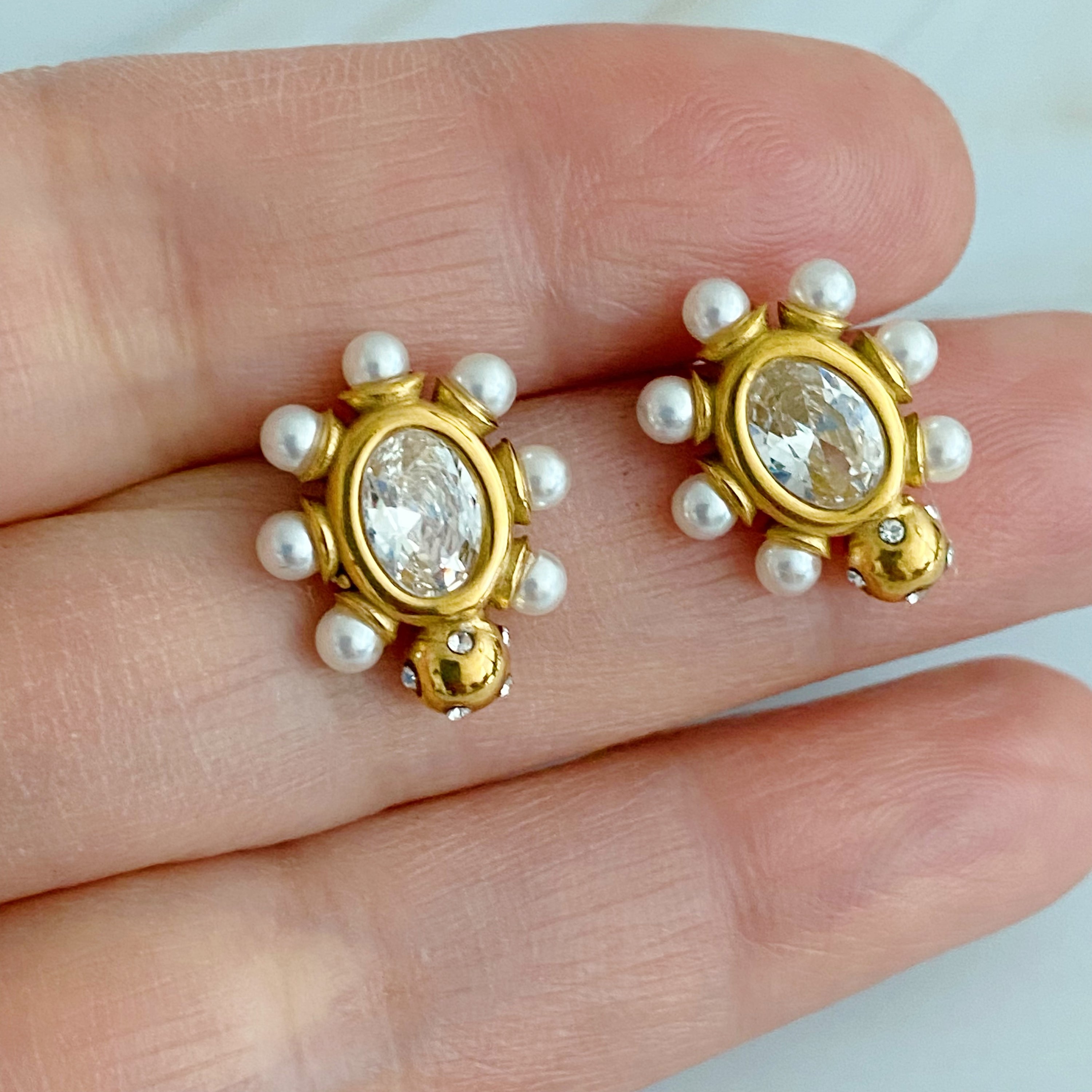 Glam On The Yacht Stud Earrings featuring pearls and sparkly stones in a delicate design, set in 18k gold plated stainless steel.