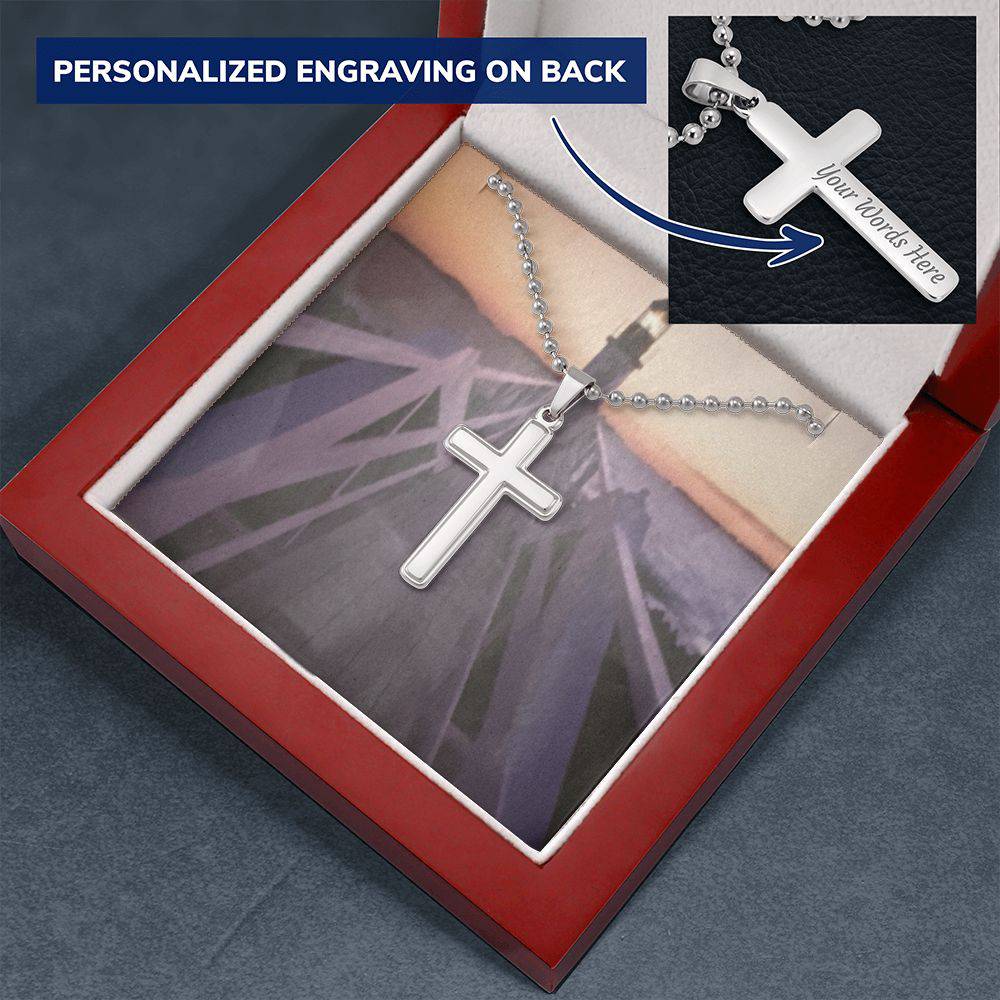 A beautifully crafted Personalized Cross Necklace made of polished stainless steel, featuring a customizable pendant and a sturdy 24-inch ball chain.