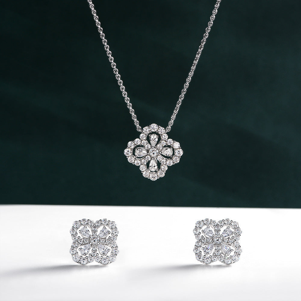 Good Luck Four Leaf Clover Necklace made of 925 sterling silver with white cubic zirconia, symbolizing hope, faith, love, and luck.