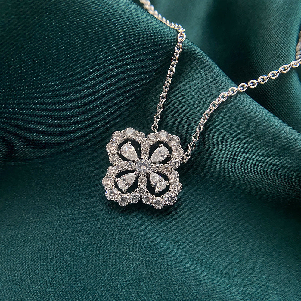 Good Luck Four Leaf Clover Necklace made of 925 sterling silver with white cubic zirconia, symbolizing hope, faith, love, and luck.