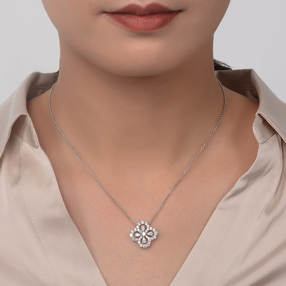 Good Luck Four Leaf Clover Necklace made of 925 sterling silver with white cubic zirconia, symbolizing hope, faith, love, and luck.