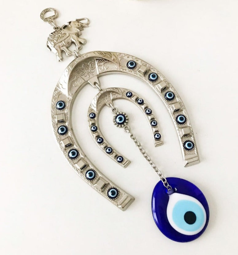 Handmade Good Luck Horseshoe Evil Eye Wall Hanging featuring unique designs and vibrant colors.