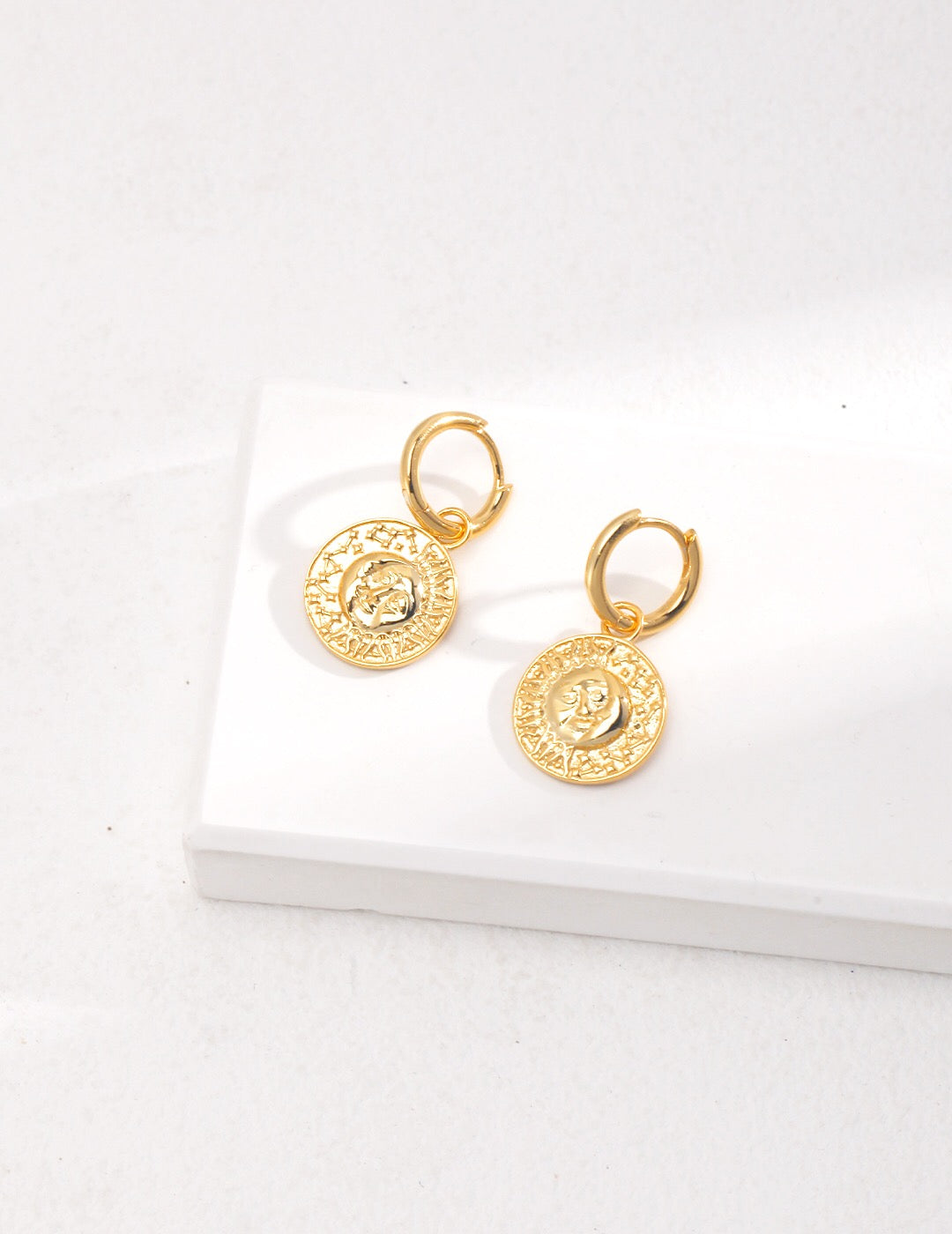 Elegant Gold Coin Earrings made of sterling silver and 18ct gold vermeil, showcasing a luxurious design.