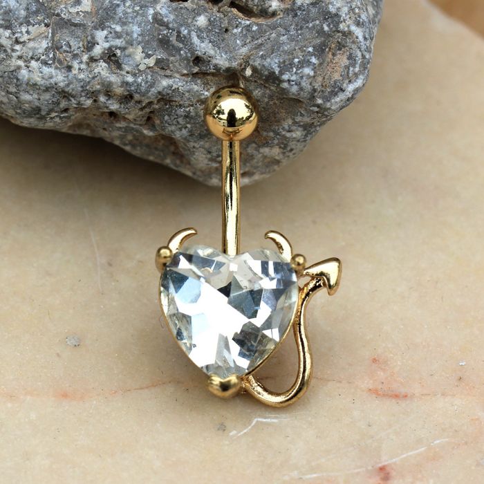 Gold Devil Heart Navel Ring featuring a heart-shaped clear CZ, devil's horns, and tail, crafted from gold plated stainless steel.