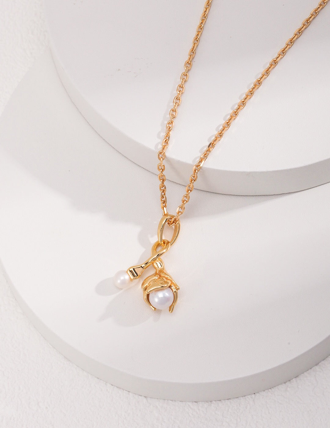 Gold Dipped Pearl Pendant Necklace featuring natural pearls and gold vermeil, elegantly designed with an adjustable chain.