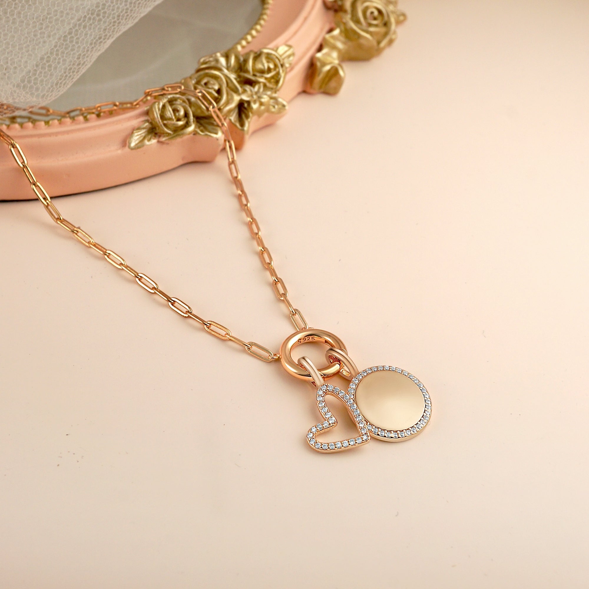 Gold Eternal Heart Charm pendant, symbolizing self-love and affection, elegantly designed with a timeless appeal.