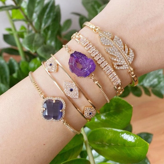 Gold Evil Eye Bracelet featuring an Amethyst Charm, handmade with adjustable design and tarnish-resistant stainless steel.