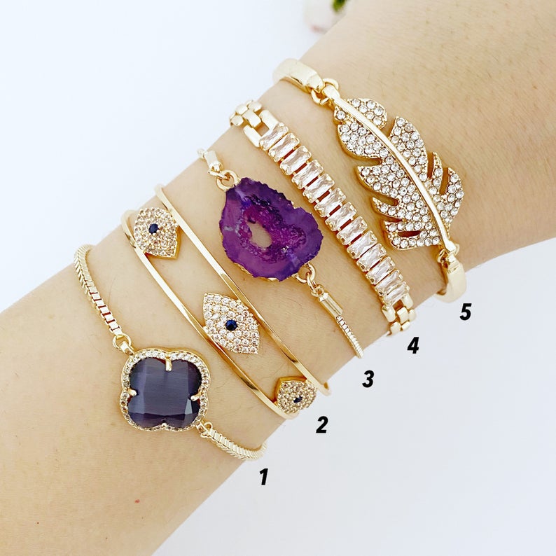 Gold Evil Eye Bracelet featuring an Amethyst Charm, handmade with adjustable design and tarnish-resistant stainless steel.