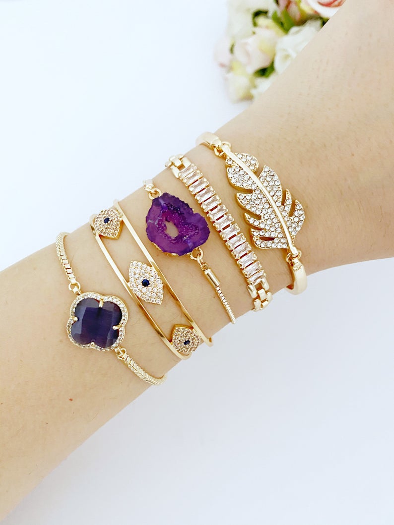 Gold Evil Eye Bracelet featuring an Amethyst Charm, handmade with adjustable design and tarnish-resistant stainless steel.