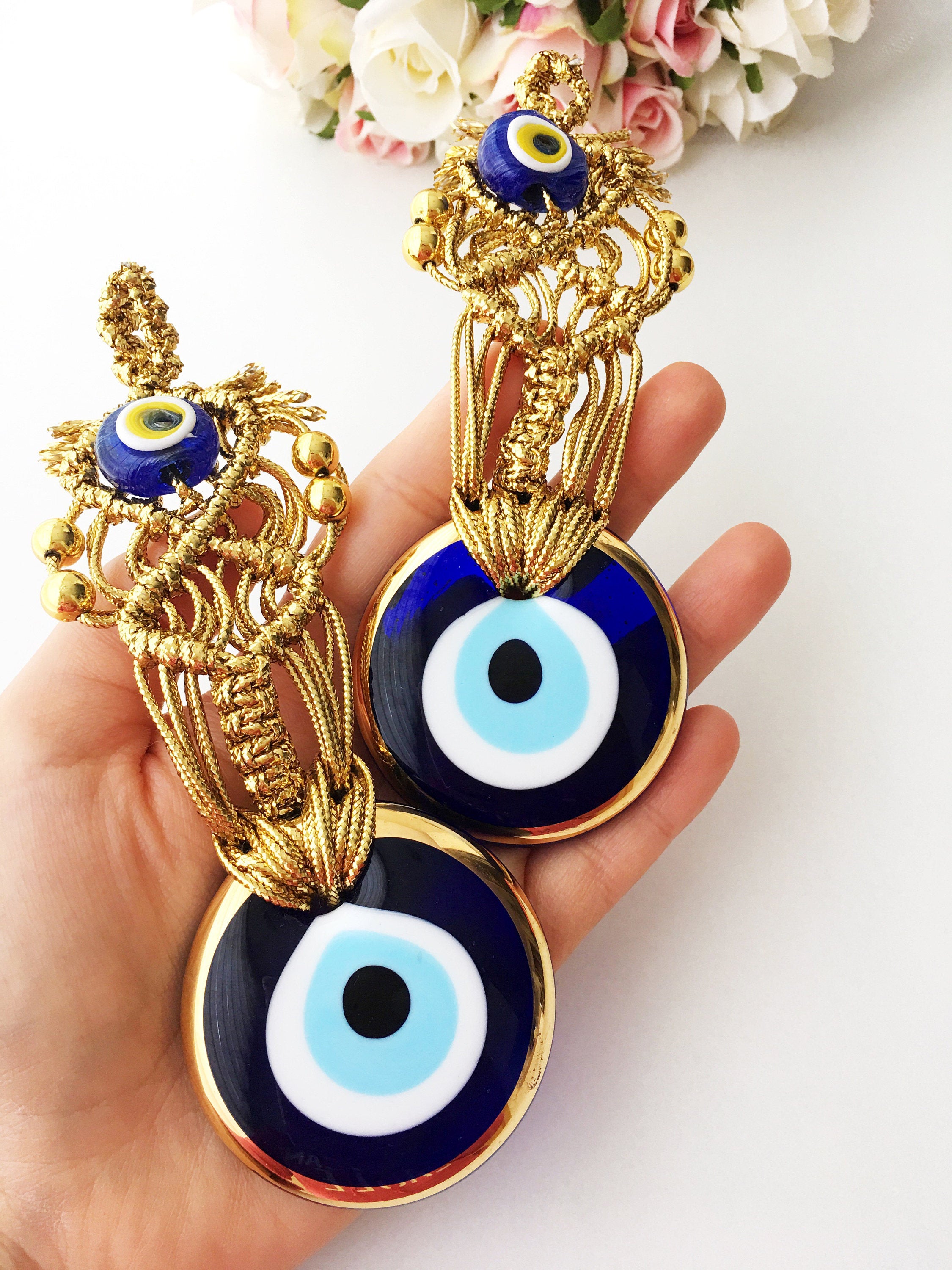 Gold Evil Eye Christmas Tree Ornament featuring a 5.5cm diameter evil eye bead and gold macrame design, perfect for holiday decor.