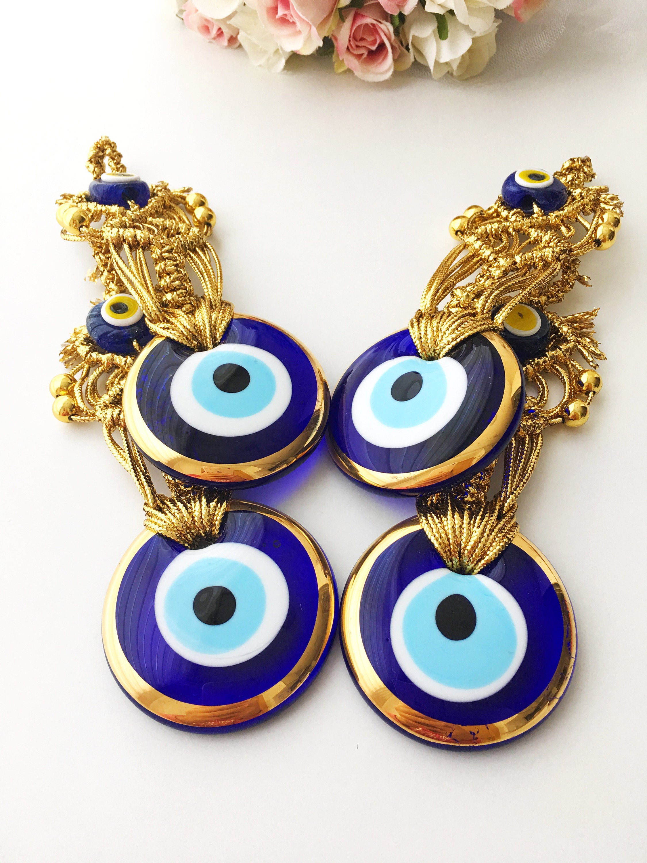 Gold Evil Eye Christmas Tree Ornament featuring a 5.5cm diameter evil eye bead and gold macrame design, perfect for holiday decor.