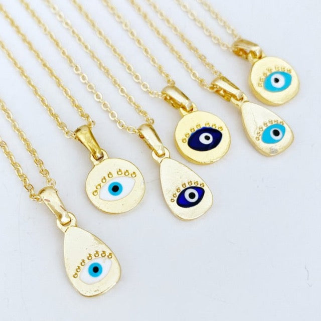 Gold Evil Eye Necklace featuring a tiny evil eye bead and teardrop charm, elegantly designed for protection and style.