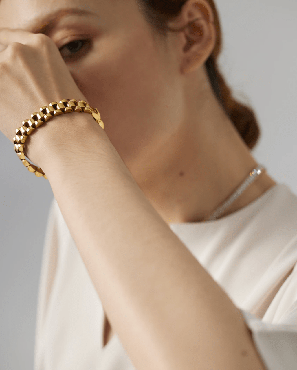 A stylish Gold Flat Chain Chunky Bracelet made of stainless steel with 18K gold plating, showcasing a thick, modern design perfect for any outfit.