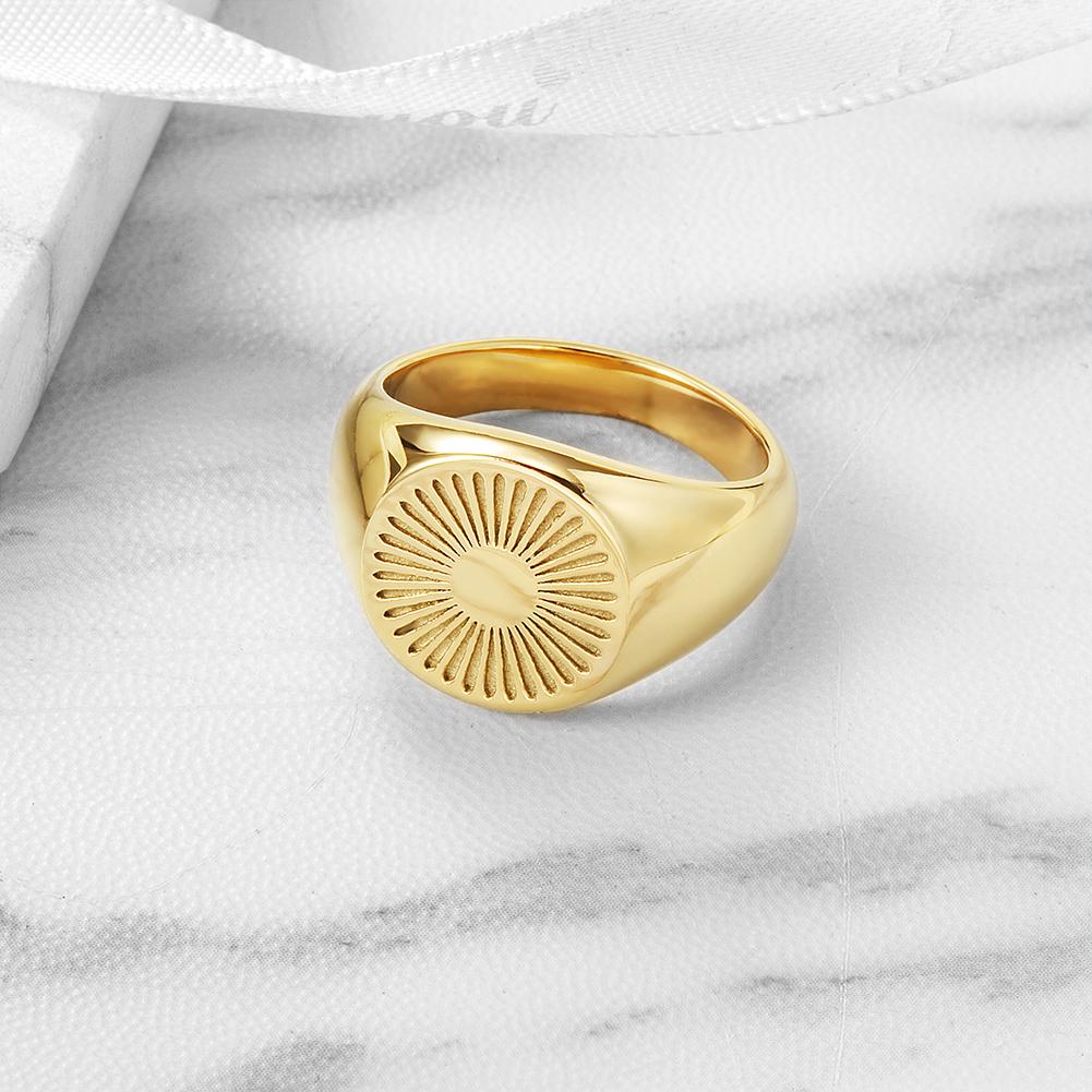 Elegant Gold Halo Ring made of 316L surgical stainless steel with 14K gold PVD plating, showcasing a sophisticated halo design.