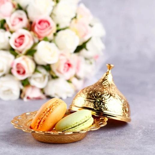 Gold luxury wedding favor box elegantly designed for special occasions, perfect for holding treats and customizable for personal touches.