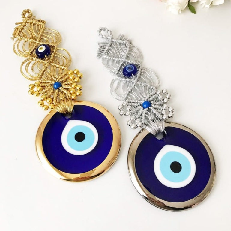 Gold Macrame Evil Eye Wall Decor featuring a 10 cm bead, elegantly handcrafted with intricate macrame design.