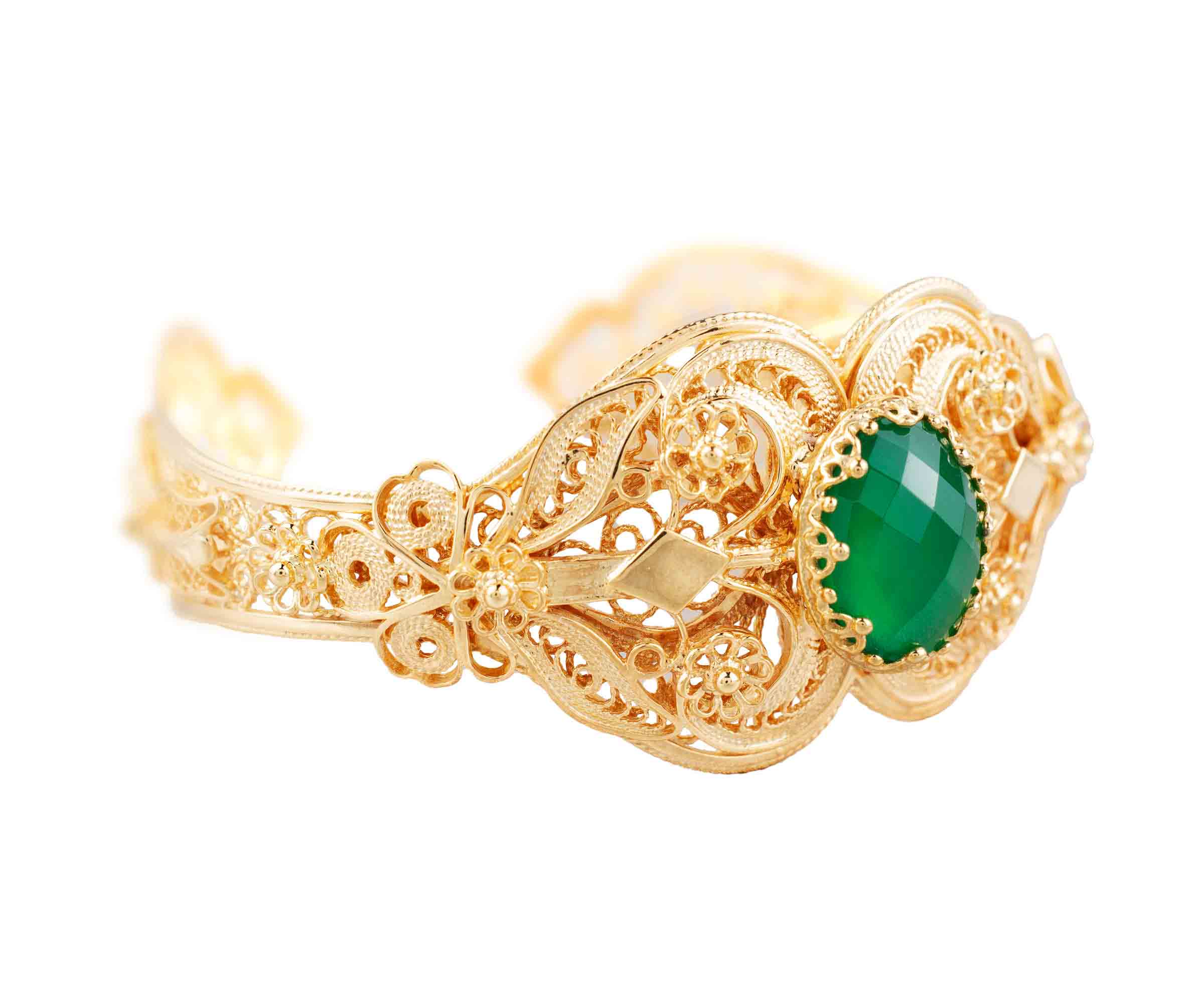 Gold plated sterling silver cuff bracelet featuring intricate filigree art and a double-sided faceted green agate gemstone.