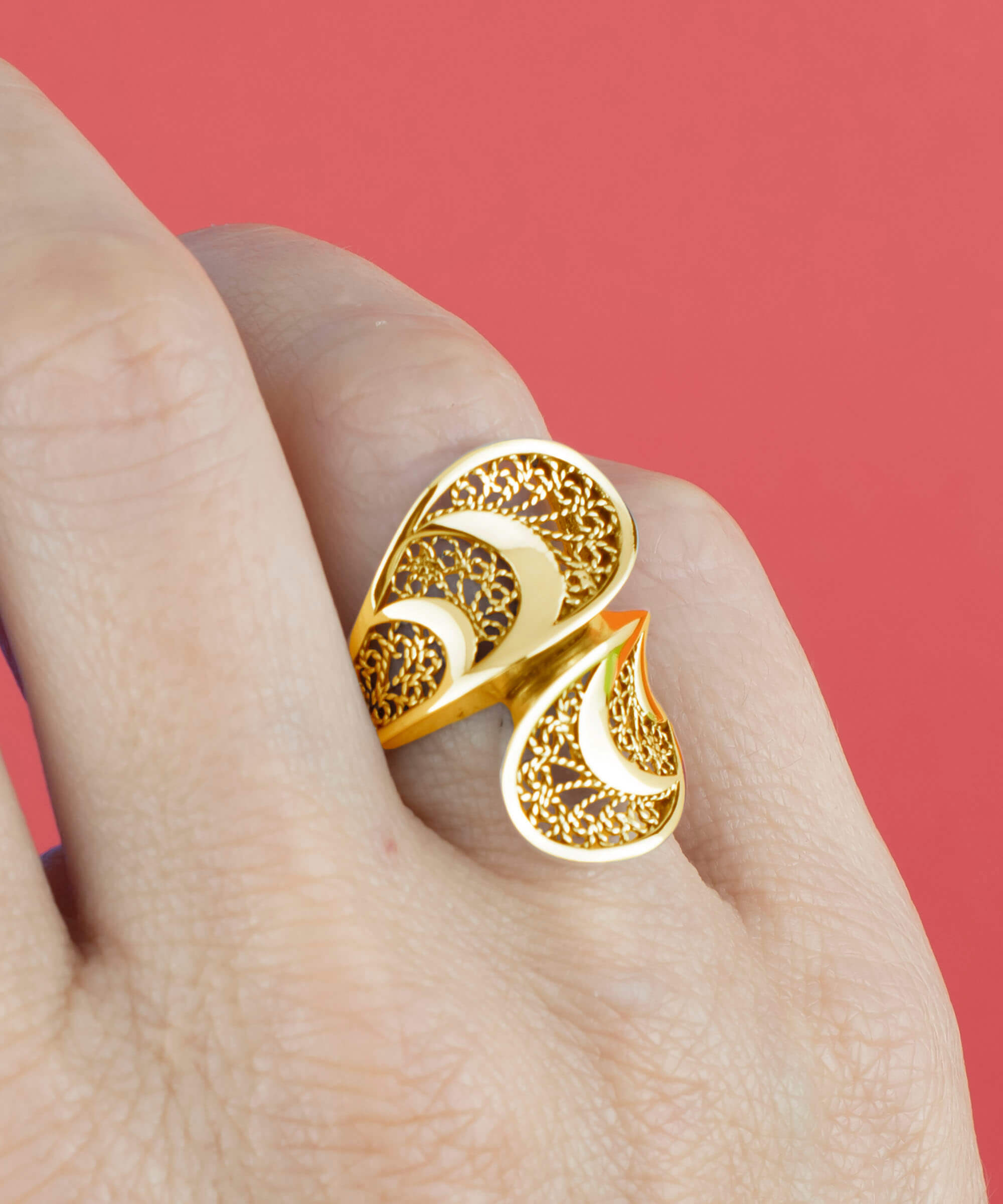 Gold plated sterling silver filigree art twisted bypass cocktail ring, showcasing intricate design and luxurious finish.