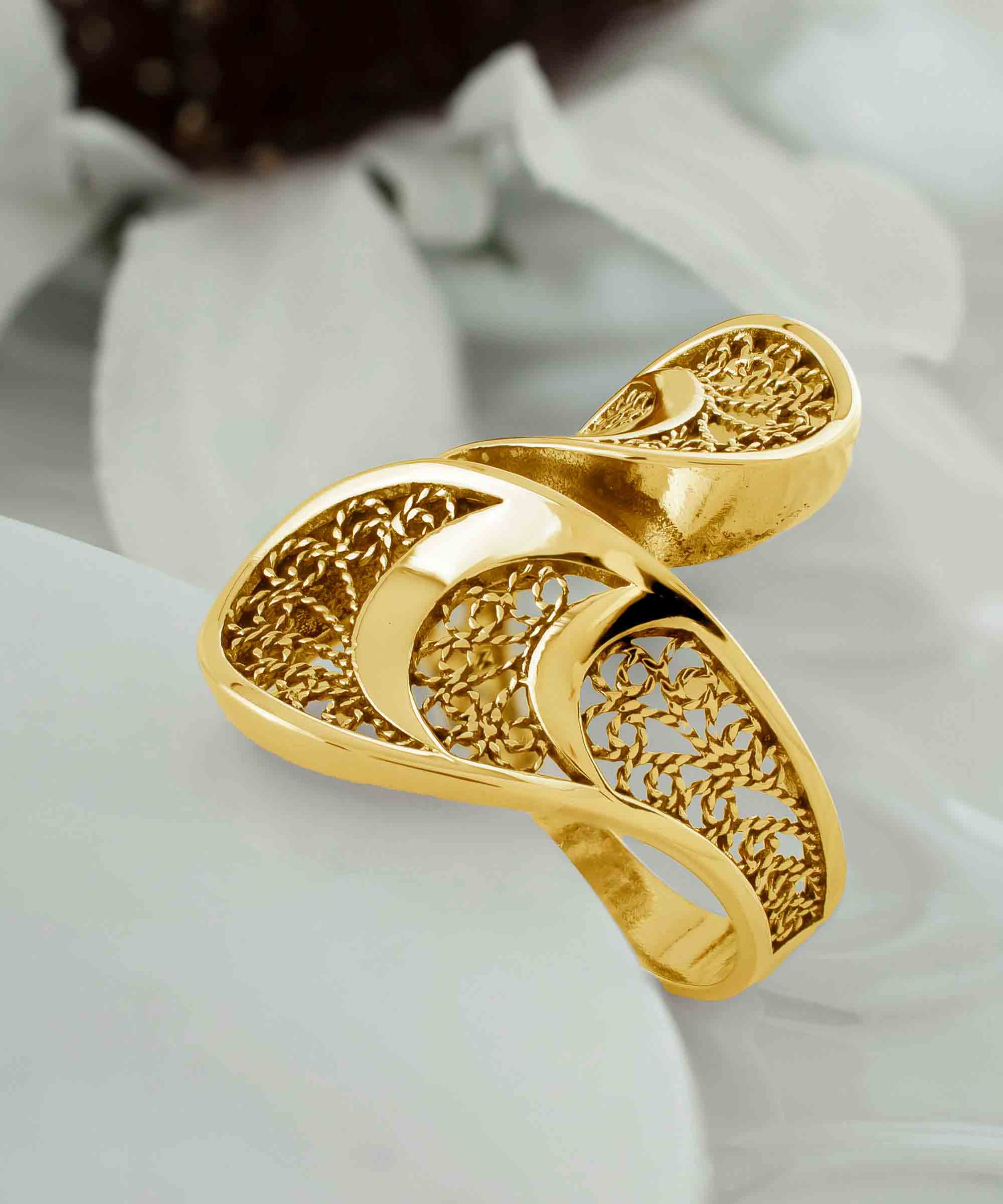 Gold plated sterling silver filigree art twisted bypass cocktail ring, showcasing intricate design and luxurious finish.