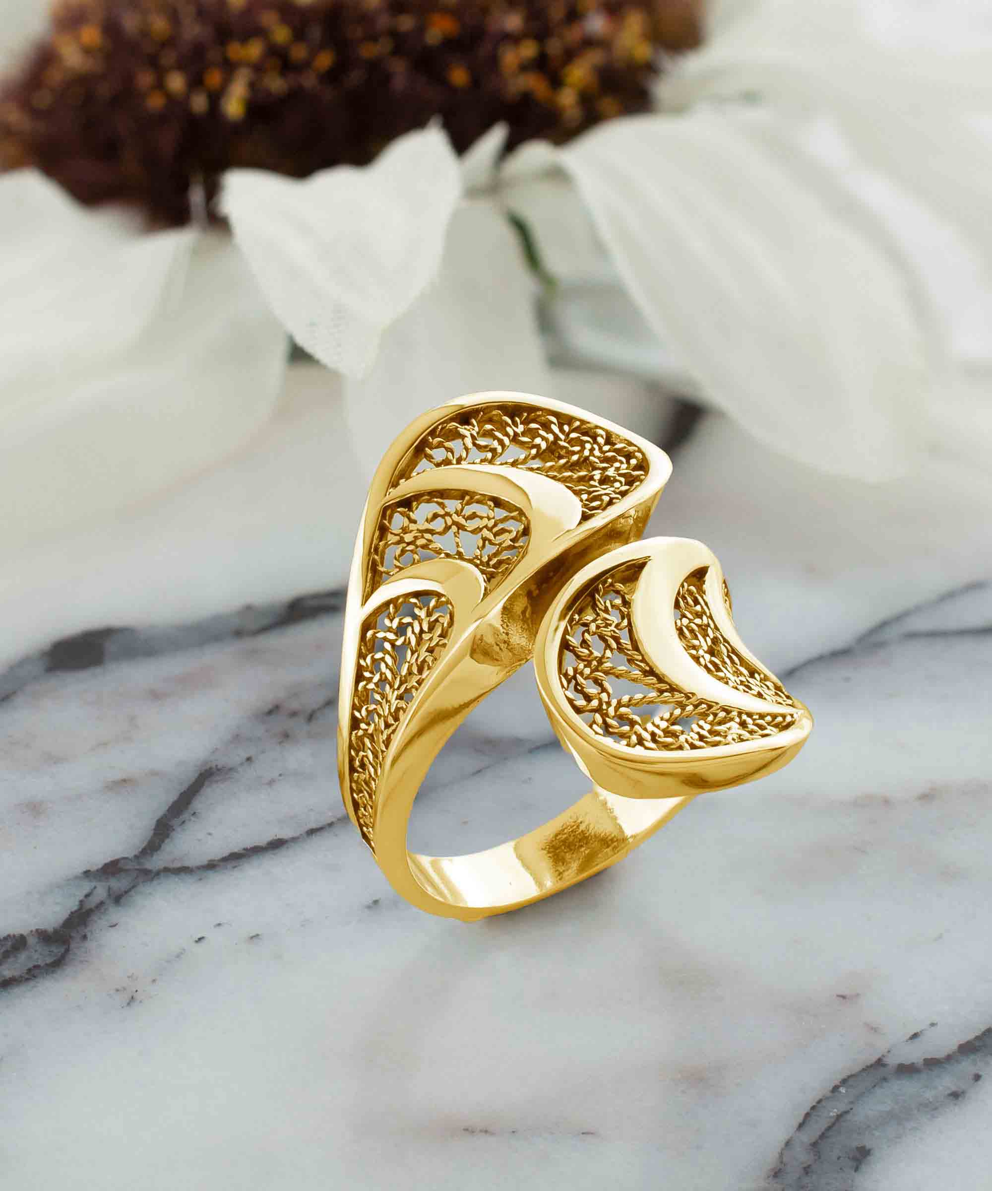 Gold plated sterling silver filigree art twisted bypass cocktail ring, showcasing intricate design and luxurious finish.