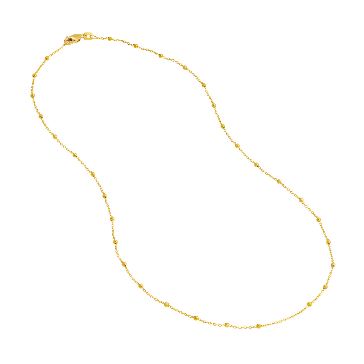 A delicate Gold Saturn Necklace made of 14k solid yellow gold, featuring a thin ball bead chain that glimmers in the light.