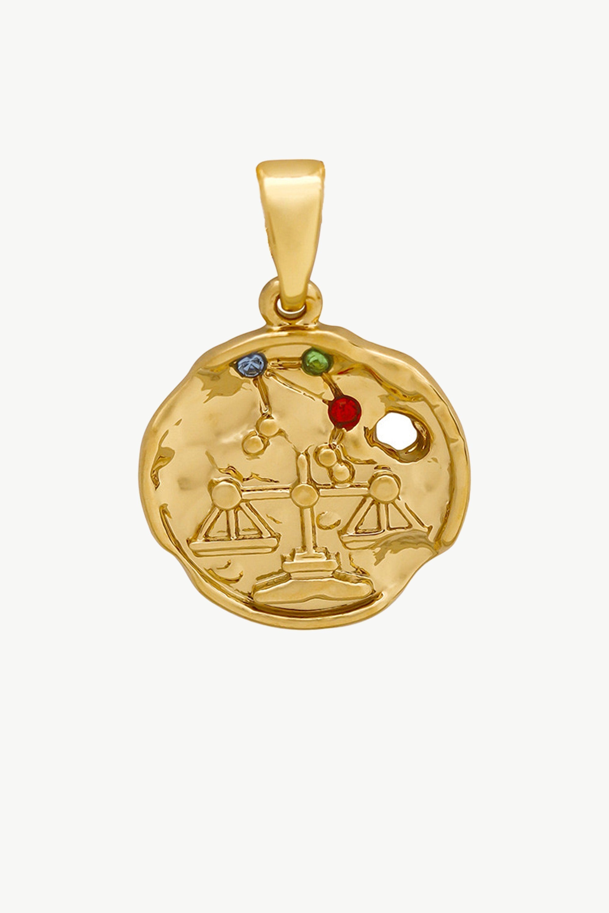 Gold Sculptural Zodiac Sign Pendant Necklace Set featuring an engraved zodiac charm, pearl necklace, and gold figaro chain.