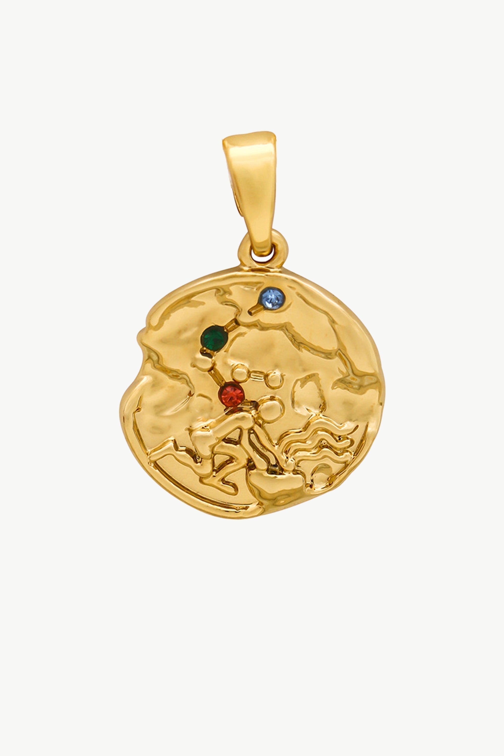 Gold Sculptural Zodiac Sign Pendant Necklace Set featuring an engraved zodiac charm, pearl necklace, and gold figaro chain.